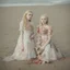 Placeholder: Elle fanning and dakota fanning as flowers, on the beach, autochrome