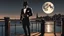 Placeholder: A sophisticated gentleman, exuding an air of elegance, stands on the edge of a serene pier. He raises a crystal wine glass, its contents catching the shimmering moonlight, in a silent toast to the celestial body above. His attire is opulent, with a tailored suit that reflects the moon's soft glow, and a relaxed smile graces his lips as he savors the tranquility of the night. The star-studded sky forms a breathtaking backdrop, casting a dreamy ambiance over the peaceful, undulating sea. This scen