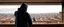 Placeholder: man in a hoodie watching the city from the balcony painted by Caravaggio
