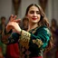 Placeholder: Medium close-up shot of the Azerbaijani dancer performing Bükmə and Sındırma. She rotates her wrists in delicate circular motions, opening her fingers one by one like a blooming lotus petal. She then rhythmically dips her right shoulder while gently tilting her head to the left with a subtle, coy smile. Emerald velvet jacket with gold embroidery, crisp focus on intricate hand gestures, elegant slow motion, 8k resolution.