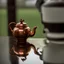 Placeholder: The reflection of a child on the surface of an old copper teapot