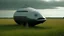 Placeholder: small, sleek, squat, cargo spaceship shaped like a whale, sitting in a field