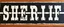 Placeholder: fill composition with large and wide historical hand painted old western sign that reads: "SHERIFF" white on black with inset white stripe boarder aged paint on wood sanserif
