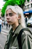 Placeholder: A white-haired teenager on a street in a military battle