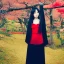 Placeholder: Women in Japan, long black hair, blue eyes, red dress