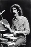 Placeholder: Frank zappa playing bongos