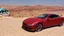 Placeholder: A Tesla's 'Model S Plaid' is racing at top speed, at Petra, in Jordan. CINEMATIC. WIDE ANGLE LENS.