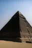 Placeholder: black pyramid on top of an egyptian pyramid