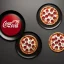 Placeholder: pizza on plate, coca cola glass, black background