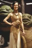 Placeholder: Liz Carr in princess Leia's slave costume of the Return of the Jedi, close to Jabba the Hutt.