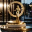 Placeholder: A magnificent golden and silver heart-shaped sign adorned with a stunning golden sphere encrusted with sparkling diamond clusters at its center, elegantly spinning in position,a girl statue standing pose