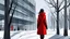 Placeholder: A digital artwork shows a woman standing outside a modern building in a snowy landscape. The woman, seen from the back, is wearing a bright red, knee-length coat with a hood, black leggings, and black boots. She is positioned to the right of the frame, near a bare tree covered in snow. The building behind her features a large glass facade." The glass is divided into a grid pattern by light blue frames. The building has a flat roof and a modern design, with a red door visible on the side. The gro