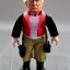 Placeholder: Donald Trump scar cheek g.i. joe doll wearing black boots