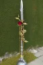 Placeholder: A large silver and Gold holy spear weapon covered in rose's and thorns, realistic, fantasy,