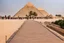 Placeholder: tourist walkway with the pyramids