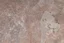 Placeholder: scratched concrete floor, low angle