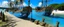 Placeholder: A blue bay with pirate ships designed in Mehndi design painted by Paul Gauguin