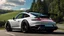 Placeholder: A sleek rear view of (((a cross of porsche and jesko))), on street, with hill and trees around, a beautiful clouds and sunny weather, 4K, Superdetailed, No mistakes