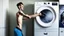 Placeholder: very skinny man is unable to lift damaged dryer