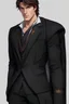 Placeholder: A white man, warlock in a suit, brown hair and brown eyes, fit and handsome. Realistic