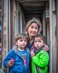 Placeholder: a poor worried mother with children taking shelter under damaged building in war torn city of Ukraine