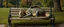 Placeholder: master oil painting by Rembrandt, flat dragon person sleeping on a bench in the park