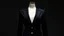 Placeholder: Ghost mannequin effect showing a black womens business office classic jacket evening dress without a human model The blazer tunic for females features golden buttons and is isolated on a