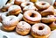 Placeholder: mini doughnuts completely covered in powdered sugar