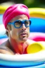 Placeholder: brad pitt sitting in donut swim ring with swimming-goggles and a bathing cap on