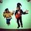 Placeholder: MR Kukrunk is Benny and DJ Roy in a disco, dancing, Kukrunk on wall