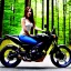 Placeholder: Very attractive woman sitting on a motorcycle. The bike is Yamaha. In the background is a forest.