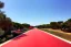 Placeholder: Day in quinta do lago, main avenida with red cycling lane