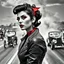 Placeholder: Create image: woman with a vintage pin-up hairstyle in greyscale tones stands in the foreground. She's wearing a zippered leather jacket and adorned with tattoos, a red bandana, earrings, and dark lipstick. In the background, a vivid scene of a drag race unfolds with classic cars and visible smoke above.