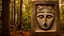 Placeholder: large stone carving of a face in the forest