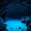 Placeholder: a dark frozen underwater cave