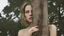 Placeholder: young woman encased and growing out of a tree