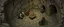 Placeholder: isometric map of 4x4 meter room, with an ogre and an orc captain, and a chest under a table, the room is rough and cavelike, we also see winding paths around the room