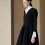 Placeholder: Fashion dress, black dress with black long sleeves, white collar, lace and silk, modern, conceptual design