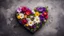 Placeholder: Garden flowers in heart shaped gift box on stone background. Top view with copy space