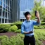 Placeholder: A short haired, Japanese Male software engineer from MIT taking a selfie in front of Building 92 at Microsoft in Redmond, Washington