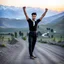 Placeholder: A full-body shot of a young tajik man wearing shirt and pants standing relaxed looking at the camera