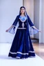 Placeholder: create a video of beautiful azerbaijani lady wearing traditional clothing dancing with sari gelin famous song and music of azerbaijan in a pretty villa garden