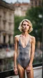 Placeholder: beautiful anorexic young woman, total shot, grey triathlon swimsuit, short blond wavy bob hair, blurred city background