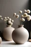 Placeholder: бежевые круглые вазы для цветов