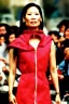 Placeholder: Rare image of Lucy Liu in Carelian Dress. 1990's women fashion with new kind of hood with tippet horizontal zipper reveals belly i.e. light dress with integrated bags of recycled denim straight, fish print with huge vulgarism that continues downwards to Haute couture e.g. tighty sewing or high dressmaking, exclusive designer creations, Label Ensemble. Off-the-rack. Hemline. In vogue. Fashion-forward bohemian.