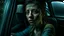 Placeholder: portrait of an arafed woman sitting in an arafed car, cracked windscreen, haunted facial expression, gritty dark color palette with shades of dull blue, sparse bluish green, sparse warm yellow, splinters of green, amazing reflections, excellent verticals, dramatic, tense, unnerving, cinematic, dynamic, tilt motion dynamics, pursuit dynamics, slight speed blur, double exposure, alienating vibe of 1980s punk aesthetics, real emotions against artificial lies, shadows of past and lost innocence