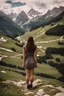 Placeholder: A young brunette woman in the alps. Her back is to the camera