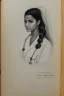 Placeholder: Pencil sketch of Young woman , nurse , Arab features,sad, long wavy hair, full body، on lined paper