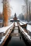 Placeholder: it's the beginning of winter, it's snowing lightly. 21st century. Russian countryside. Two hunters and a dog in a boat approach a completely destroyed wooden bridge over a river leading to a village, with several wooden piles sticking out of the water. A dilapidated Orthodox church stands on the right bank. High quality image in 8K format.
