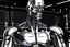 Placeholder: sculpted in the style of Michelangelo every square inch of his rippling epidermis brilliantly gleams like newly polished chrome 8 foot tall android robot nod to 1950's tv scifi lore depicted as accurate model to actual scale pro quality photo real